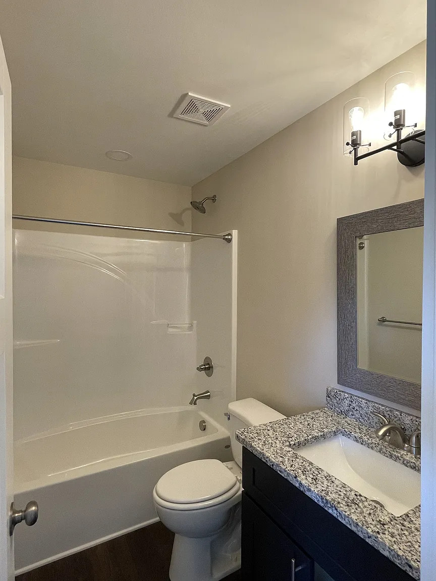 Magnolia duplex full bathroom — after