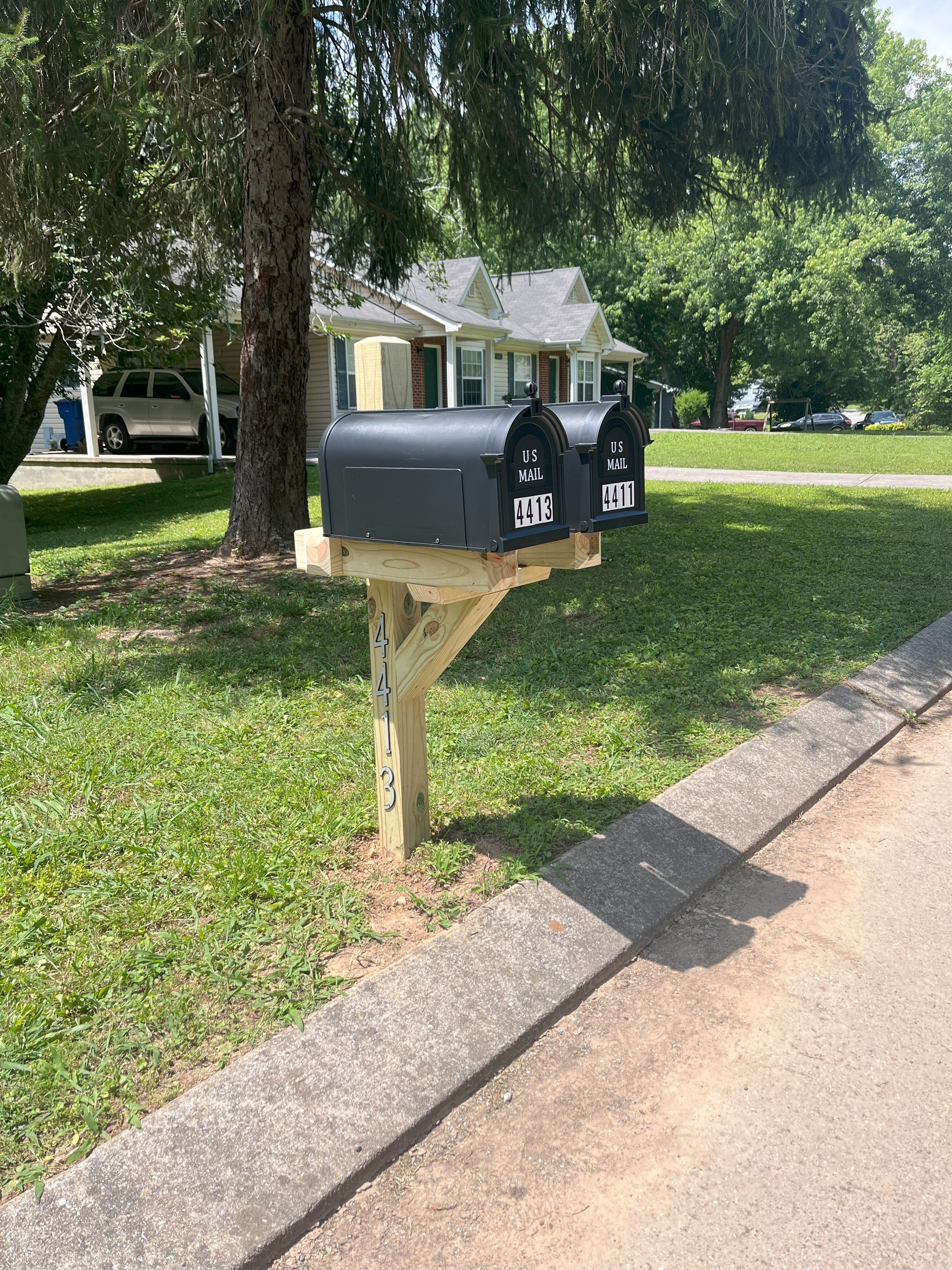 Twin mailbox post installation — after